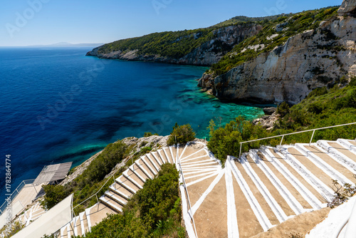 Fototapeta Naklejka Na Ścianę i Meble -  Greece, Zakynthos, Skinari View Point - 5 April 2024 - View of the sea and the beautiful staircase at Skinari View Point