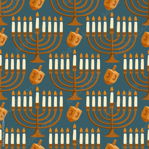 Vector seamless pattern with menorahs and dreidels on blue background. Happy Hanukkah