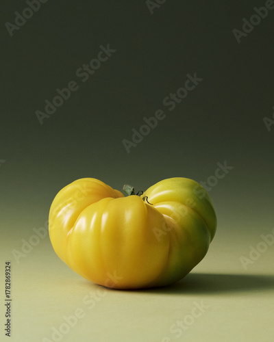 Yellow Heirloom Tomatoes Painterly Still Life on Green Seamless background. Film grain
