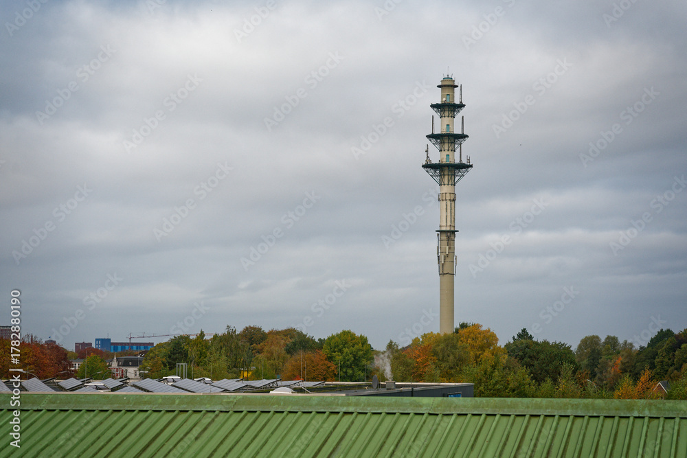 Obraz premium Tiered concrete tower column with three stacked platforms