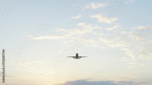 3840x2160 Ultra HD. The plane flies in the blue sky. travel. Airplane takes off in the background of blue sky. 4K.