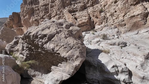 Wadi Bani Khalid is a popular tourist destination in Oman, known for its lush oasis, clear turquoise pools, and rugged mountain scenery.

