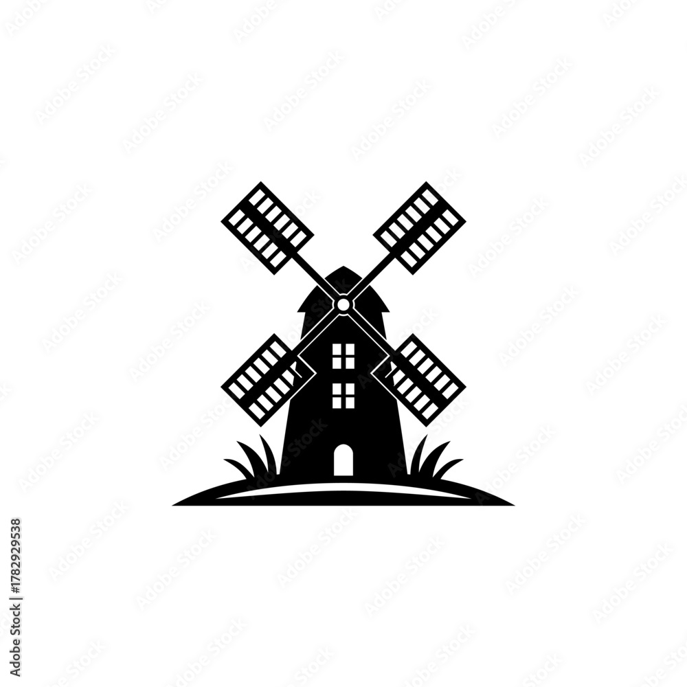 Fototapeta premium Vector illustration of a traditional windmill with large blades standing on grassy ground in a simple black design