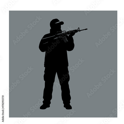 Silhouette of a Tactical Shooter Aiming a Rifle