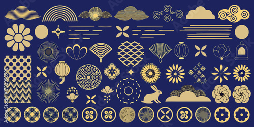 Collection of japanese inspired golden motifs and symbols on a dark blue background