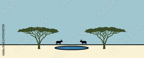 Wildlife at watering hole in African savanna