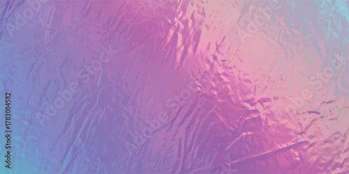 Abstract holographic texture with iridescent colors and crumpled surface.