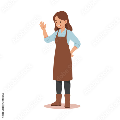 Friendly woman in brown apron and boots waving hello.