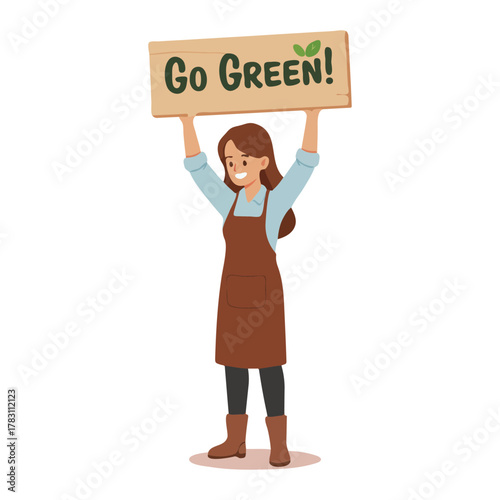 Woman holding a Go Green sign with a leaf symbol promoting environmental awareness.