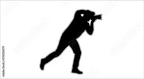 Dynamic silhouette of photographer in action capturing the perfect shot, ideal for visual storytelling, professional blog, or creative project needs