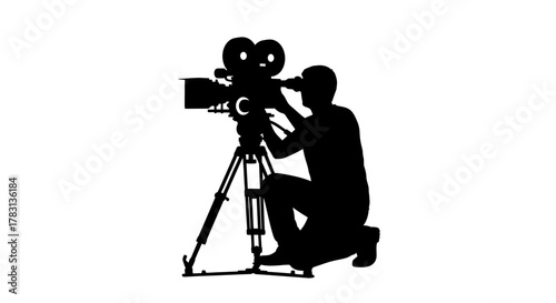 Dynamic silhouette of a focused filmmaker using a vintage camera on a tripod, perfect for cinema history or behind-the-scenes content creation projects
