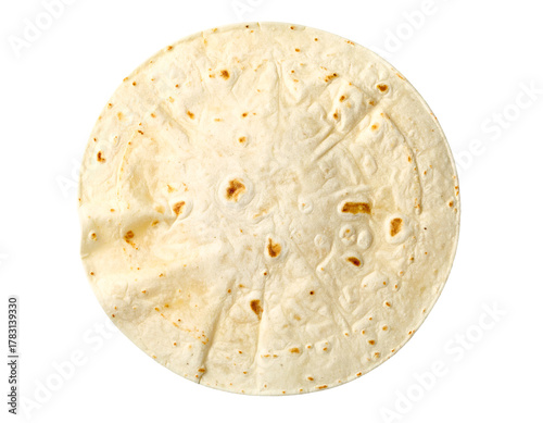 Round flour tortilla flatbread top view with toasted spots and soft texture, plain white wrap ready for tacos on isolated background