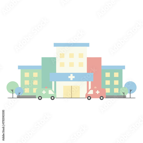 Contemporary Hospital Building With Symmetrical Wings And Ambulances In Front On A Clear Day