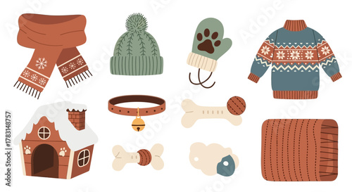 A collection of winter clothing items for humans and pet accessories including a dog house and toys.