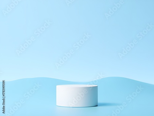 White cylinder podium on light blue background with soft wavy shapes for presentation