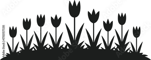 Black silhouette flower bed with tulips and grass on white background