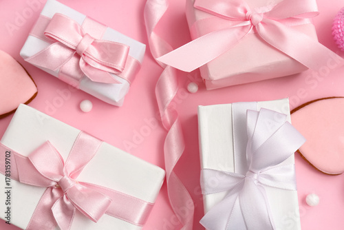 Pink and white gift boxes w...
