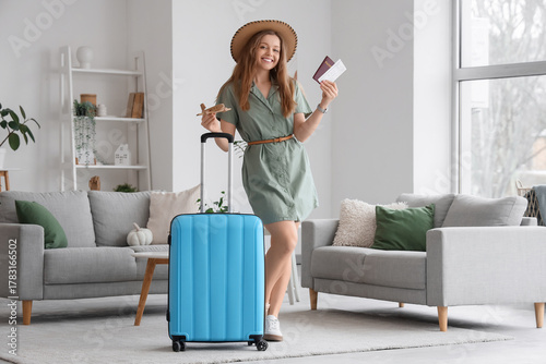 Happy young woman in summer...