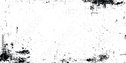 Grunge black and white distressed texture overlay with rough ink splatters and scratches for vintage design background for wall textured.