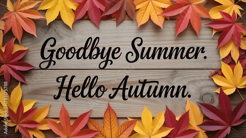 Autumn greeting background with colorful fall leaves and wood texture