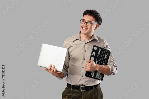 Male screenwriter with lapt...