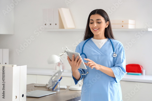 Female doctor working with ...