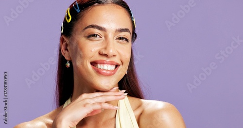Photos Portrait, confident and woman with makeup in studio for beauty, natural shine and makeover