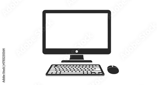 Modern desktop computer setup featuring a sleek monitor, wireless keyboard, and mouse, ideal for technology, office, and digital themes