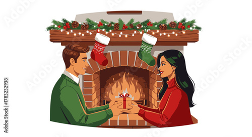 A couple exchanging a gift in front of a fireplace decorated for Christmas.