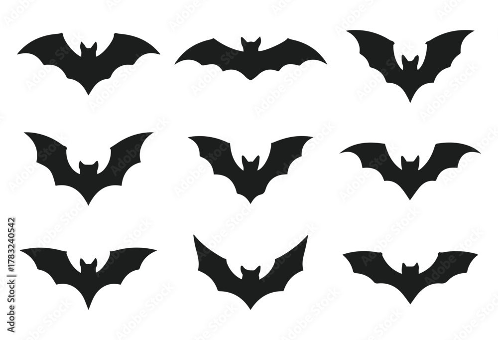 Naklejka premium vector silhouettes set of flying bat