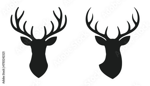 vector silhouette of deer heads with antlers