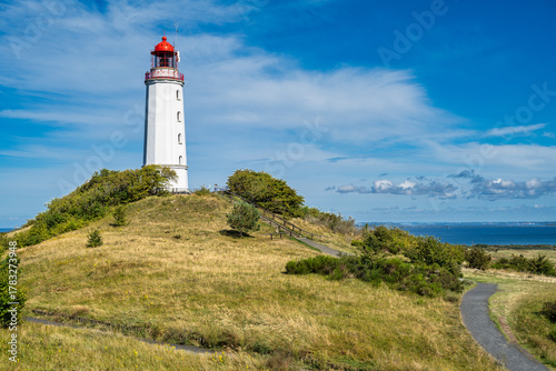 Fototapeta Naklejka Na Ścianę i Meble -  A view of the lighthouse from the island of Hiddensee on the Baltic Sea