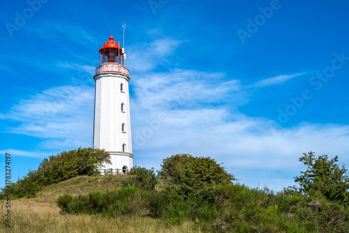 Fototapeta Naklejka Na Ścianę i Meble -  A view of the lighthouse from the island of Hiddensee on the Baltic Sea