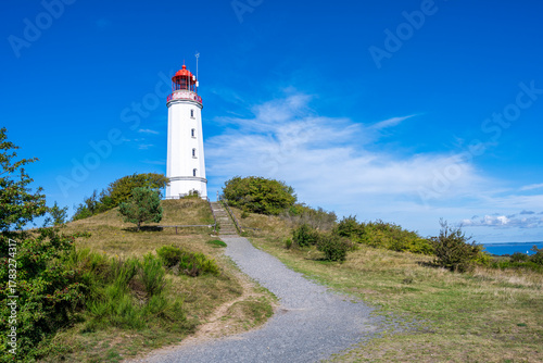 Fototapeta Naklejka Na Ścianę i Meble -  A view of the lighthouse from the island of Hiddensee on the Baltic Sea