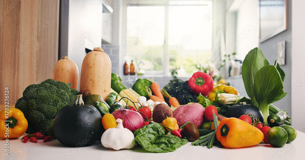 Obraz premium Vegetables, organic groceries or kitchen counter with ingredient variety, plant based diet or nutrition. Fresh produce, meal prep or collection of natural food for vegan menu, health or detox in home