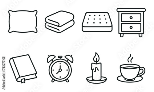 Cozy bedroom essentials: pillow, towels, mattress, nightstand, book, clock, candle, cup
