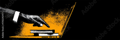 Une main professionnelle interagit avec des livres posés sur un ordinateur portable, symbolisant l'apprentissage numérique et l'accès à la connaissance.