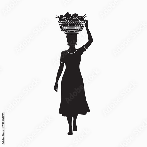 African woman carrying basket on head silhouette