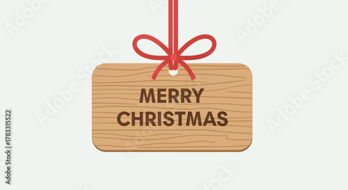 Rustic wooden sign with merry christmas text and red ribbon bow hanging against a plain background