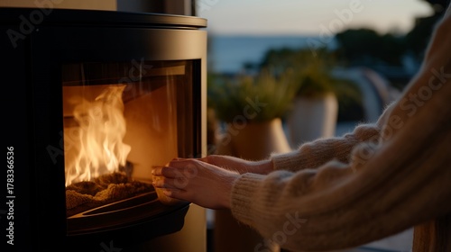 A homeowner maintaining a pellet stove, representing sustainable fuel use, domestic energy efficiency, and responsible heating practices. cinematic color correction, natural uneven lighting yet