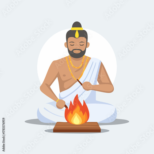 Man performing a Hindu fire ritual with a sacred flame.
