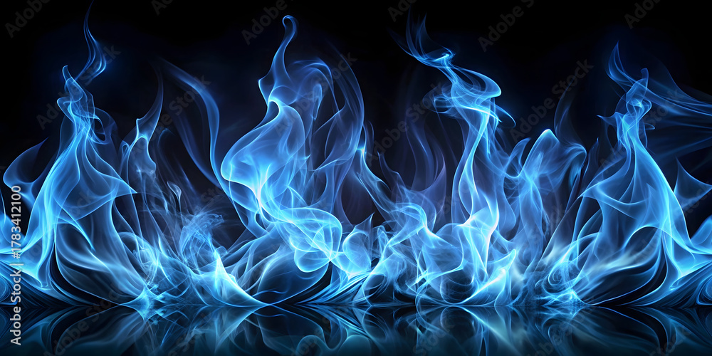 Fototapeta premium Blue fire flames on a black background. Abstract background for design.