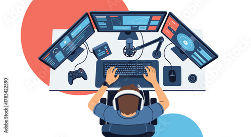 Overhead view of a gamer using multiple monitors and a microphone at their desk.