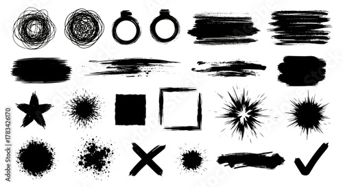 Collection of black ink brush stroke elements including scribbles paint splatters star square cross and check mark