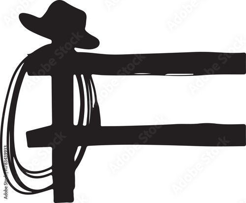 Silhouette of a cowboy hat and lasso on a wooden fence