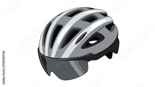 A gray cycling helmet with a visor and ventilation slots