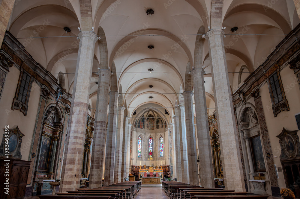 Fototapeta premium The Church of San Francesco is a religious building located in Gubbio, built in the second half of the 13th century. The exterior retains its Gothic apse, and the bell tower stands next to it.