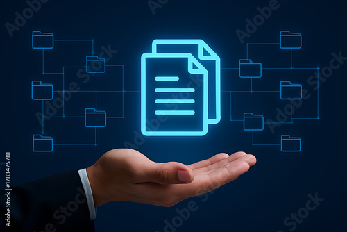 Hand holding a glowing blue icon of two documents connected to a network of folders representing digital document management secure data sharing cloud storage system and file organization