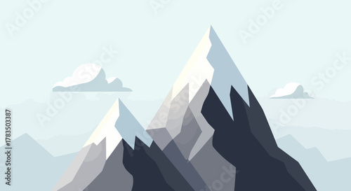 Majestic snow-capped mountain peaks piercing a serene, hazy sky, illustrating the grandeur of nature's majestic formations