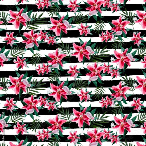 Pink lily flowers and green palm leaves on black and white stripes floral pattern tropical leaves